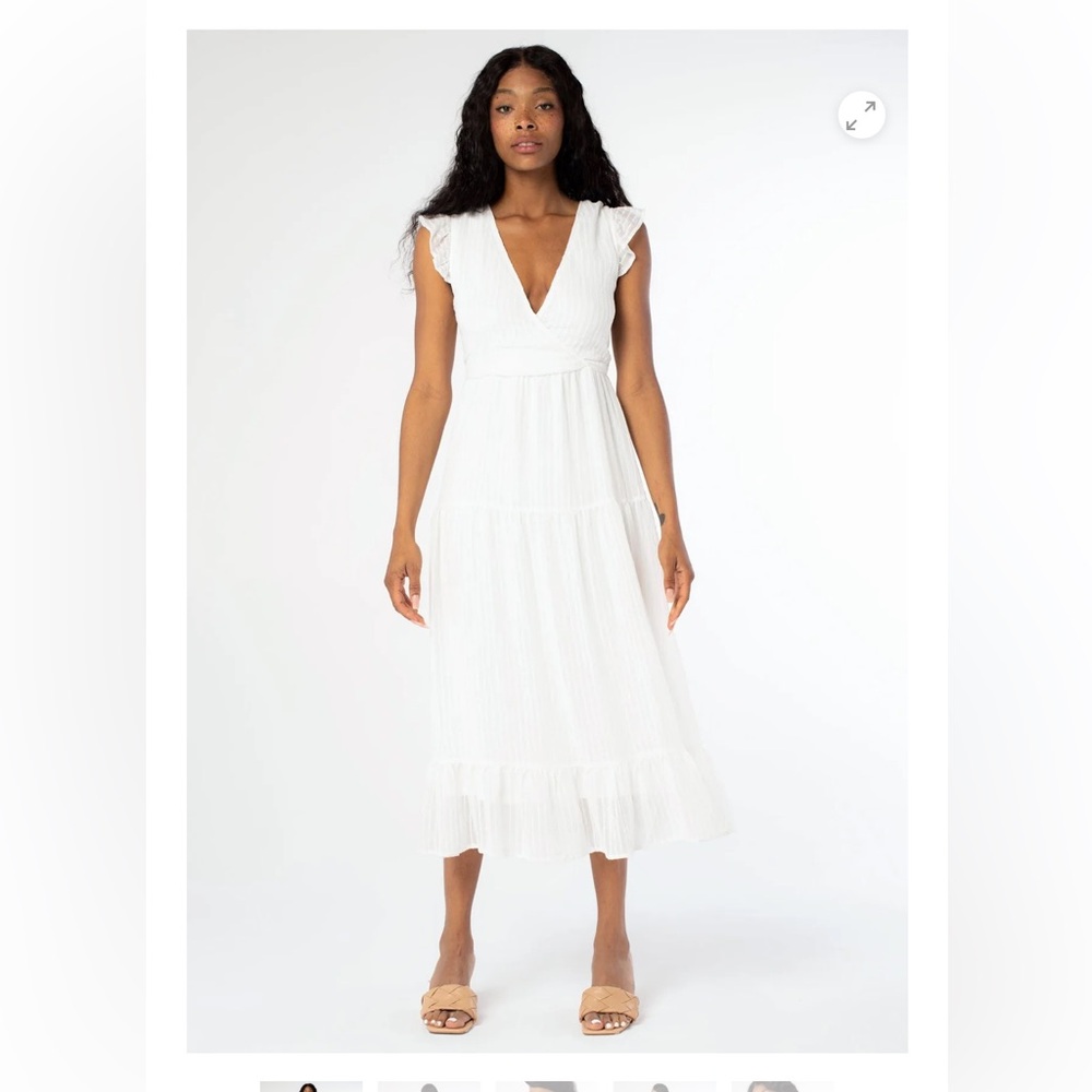 Elegant White Maxi Dress by Lovestich. Size small.